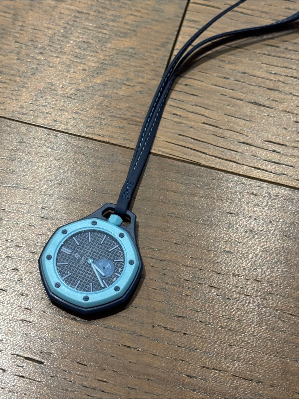 Swatch Light Blue Pendant Watch on Navy Strap